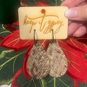NWT Keep It Gypsy leather snake pattern earrings.